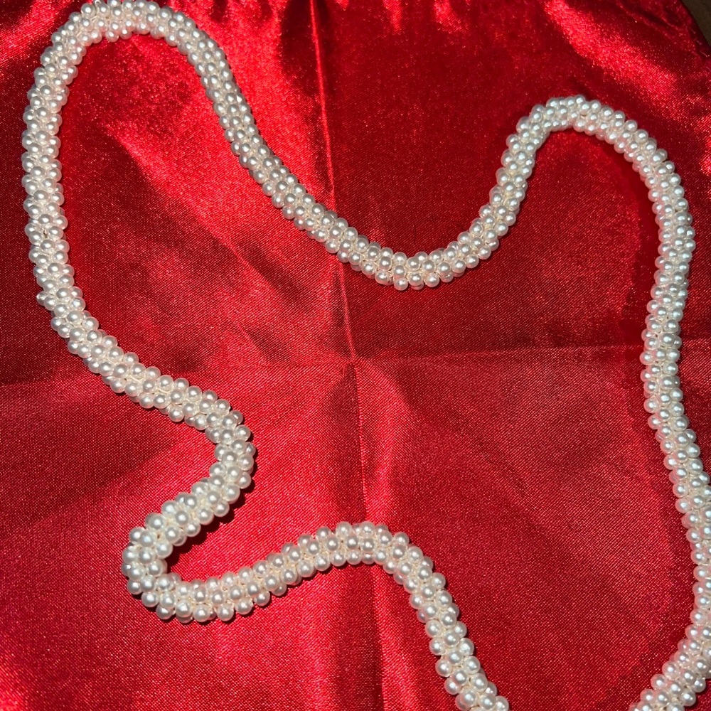vintage pearl string necklace on a string